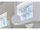 Bathroom detail showing a stylish light fixture and window at 377 Anders N, Chattahoochee Hills, GA 30268