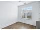 Well-lit bedroom with hardwood floors and large window at 377 Anders N, Chattahoochee Hills, GA 30268