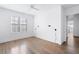 Spacious bedroom with hardwood floors and large windows at 377 Anders N, Chattahoochee Hills, GA 30268