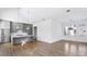 Open concept kitchen with gray cabinets and island at 377 Anders N, Chattahoochee Hills, GA 30268