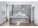 Stylish kitchen featuring gray cabinets and island at 377 Anders N, Chattahoochee Hills, GA 30268