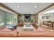 Cozy living room showcasing a fireplace, hardwood floors, and an adjacent dining area at 2953 Collier Nw Dr, Atlanta, GA 30318