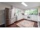 Bright kitchen with white cabinets and stainless steel appliances at 285 Glen Lake Dr, Atlanta, GA 30327