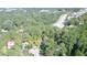 This aerial view showcases the property's mature trees next to a railroad at 4671 Collins Ave, Acworth, GA 30101