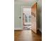 Inviting entryway showcasing hardwood floors and access to the sunroom at 1366 Emory Ne Rd, Atlanta, GA 30306