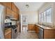Spacious kitchen with stainless steel appliances and granite counters at 1366 Emory Ne Rd, Atlanta, GA 30306