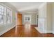 Spacious living room featuring hardwood floors, fireplace, and natural light at 1366 Emory Ne Rd, Atlanta, GA 30306