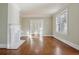Bright living room boasting hardwood floors, fireplace, and views into other rooms at 1366 Emory Ne Rd, Atlanta, GA 30306