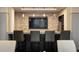 Stylish bar area with stone countertops, modern seating, and a large television at 3475 Oak Valley Rd # 2820, Atlanta, GA 30326
