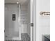 Modern bathroom with subway tile shower and patterned floor at 3475 Oak Valley Rd # 2820, Atlanta, GA 30326
