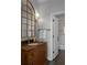 Elegant bathroom with dark wood vanity and a modern mirror at 3475 Oak Valley Rd # 2820, Atlanta, GA 30326