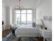 Modern bedroom with city views and a comfortable seating area at 3475 Oak Valley Rd # 2820, Atlanta, GA 30326