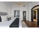 Elegant Primary bedroom with a king bed and large windows at 3475 Oak Valley Rd # 2820, Atlanta, GA 30326