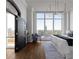 Bright bedroom with city views and hardwood floors at 3475 Oak Valley Rd # 2820, Atlanta, GA 30326