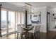 Modern dining room with hardwood floors and a glass dining table at 3475 Oak Valley Rd # 2820, Atlanta, GA 30326