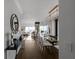 Open concept dining room with hardwood floors and modern chandelier at 3475 Oak Valley Rd # 2820, Atlanta, GA 30326