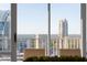 Dining room with scenic city views from window at 3475 Oak Valley Rd # 2820, Atlanta, GA 30326