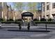 Elegant gated entrance to The Oaks Buckhead featuring manicured landscaping and classic architecture at 3475 Oak Valley Rd # 2820, Atlanta, GA 30326