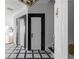 Elegant entryway with black and white checkered floor at 3475 Oak Valley Rd # 2820, Atlanta, GA 30326
