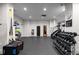 Fitness center with weights, exercise equipment, water fountain and tile flooring at 3475 Oak Valley Rd # 2820, Atlanta, GA 30326