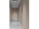 Hallway with tile flooring and neutral painted walls at 3475 Oak Valley Rd # 2820, Atlanta, GA 30326