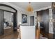 Home office with a desk, hardwood floors and view into bedroom at 3475 Oak Valley Rd # 2820, Atlanta, GA 30326