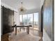 Modern home office with barn doors, hardwood floors, and city views at 3475 Oak Valley Rd # 2820, Atlanta, GA 30326
