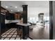 Modern kitchen with dark cabinetry and quartz counters at 3475 Oak Valley Rd # 2820, Atlanta, GA 30326