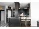 Modern kitchen with island and bar stools at 3475 Oak Valley Rd # 2820, Atlanta, GA 30326