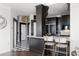 Modern kitchen with island and bar stools at 3475 Oak Valley Rd # 2820, Atlanta, GA 30326
