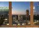 Living room showcasing city lights and cityscape at dusk at 3475 Oak Valley Rd # 2820, Atlanta, GA 30326