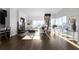 Spacious living room with hardwood floors, city views, and modern furniture at 3475 Oak Valley Rd # 2820, Atlanta, GA 30326