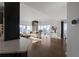 Spacious living room with hardwood floors and city views at 3475 Oak Valley Rd # 2820, Atlanta, GA 30326