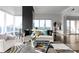 Sun-drenched living room with city views and comfortable seating at 3475 Oak Valley Rd # 2820, Atlanta, GA 30326