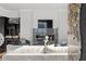 Comfortable living room featuring a modern fireplace and city views at 3475 Oak Valley Rd # 2820, Atlanta, GA 30326