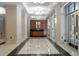 Grand lobby featuring elegant flooring, columns, wood accents and stylish lighting at 3475 Oak Valley Rd # 2820, Atlanta, GA 30326