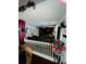 Living area with sectional sofa and a half wall at 405 Pecan Wood, Fairburn, GA 30213