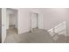 Charming bedroom with carpet, closet, and hallway access at 5423 Flat Rock Pt, Stonecrest, GA 30038