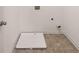 Laundry room with vinyl flooring and a built-in drain at 5423 Flat Rock Pt, Stonecrest, GA 30038