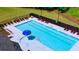 Community pool with plenty of lounge chairs at 5423 Flat Rock Pt, Stonecrest, GA 30038