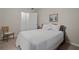 Bedroom featuring neutral walls, carpet, and a large bed at 1801 Liberty Nw Pkwy, Atlanta, GA 30318