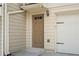 Close up view of a townhome front door and attached garage at 1801 Liberty Nw Pkwy, Atlanta, GA 30318