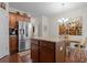 Modern kitchen with stainless steel appliances, granite countertops, and hardwood floors at 1801 Liberty Nw Pkwy, Atlanta, GA 30318