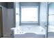 Bathroom with large soaking tub and separate shower at 295 Whitby Dr, Douglasville, GA 30134