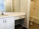 Bathroom featuring vanity with sink and storage space, next to shower and bathtub at 295 Whitby Dr, Douglasville, GA 30134
