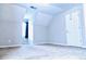 This empty bedroom is spacious and bright, with a window providing ample light at 295 Whitby Dr, Douglasville, GA 30134