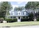 Charming single Gathering home boasts mature trees and pristine landscaping at 295 Whitby Dr, Douglasville, GA 30134