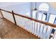 View of a staircase leading to a room with white French doors and large windows at 295 Whitby Dr, Douglasville, GA 30134
