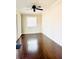 Sun room featuring hardwood floors, bright windows and a ceiling fan at 295 Whitby Dr, Douglasville, GA 30134