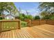 Enjoyable backyard with a wooden deck, lush green lawn, privacy fence, and ample space, perfect for gatherings at 1331 Walker Ave, Atlanta, GA 30344